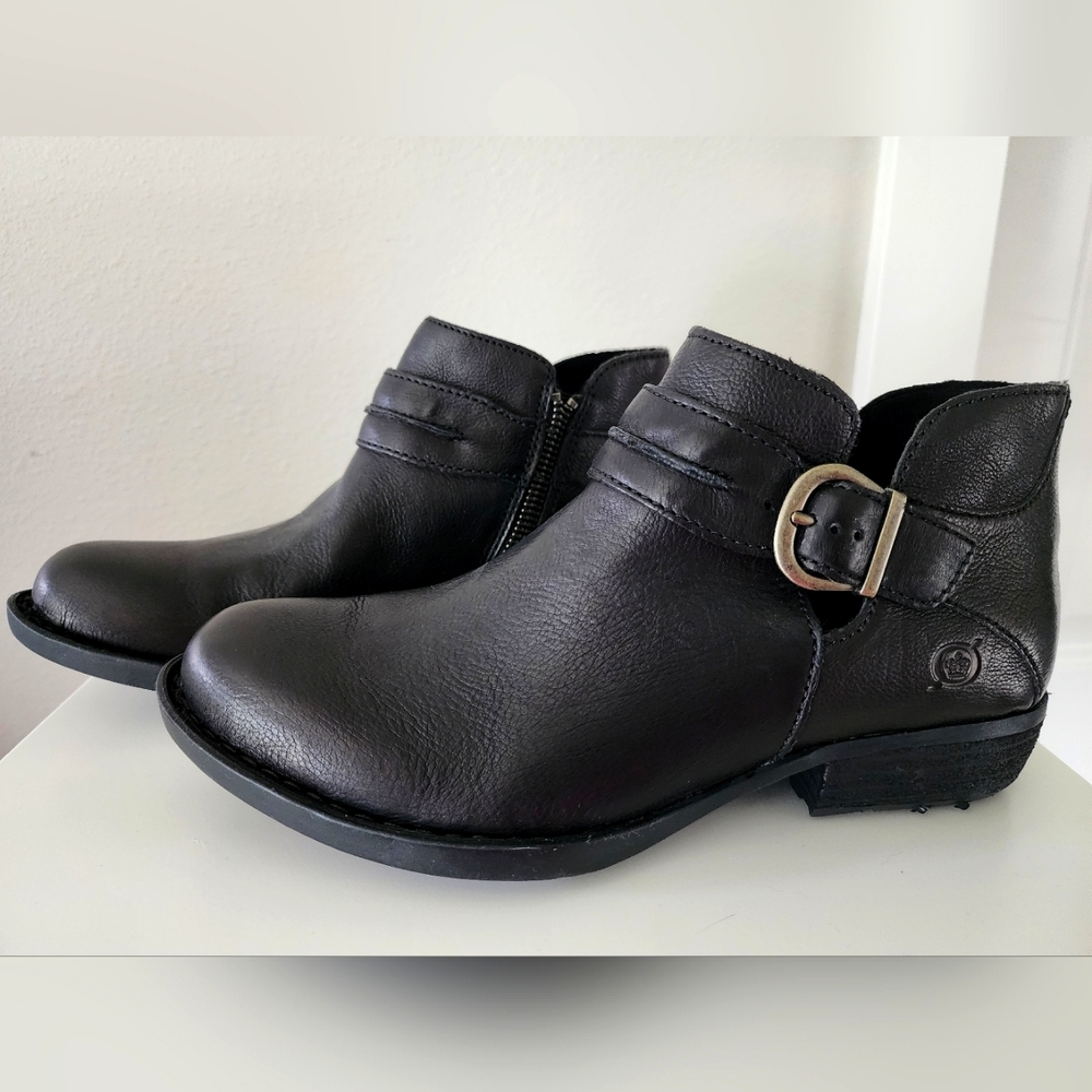 Born booties. Brand new. Size 6.5. Black with buckle design and side zipper.